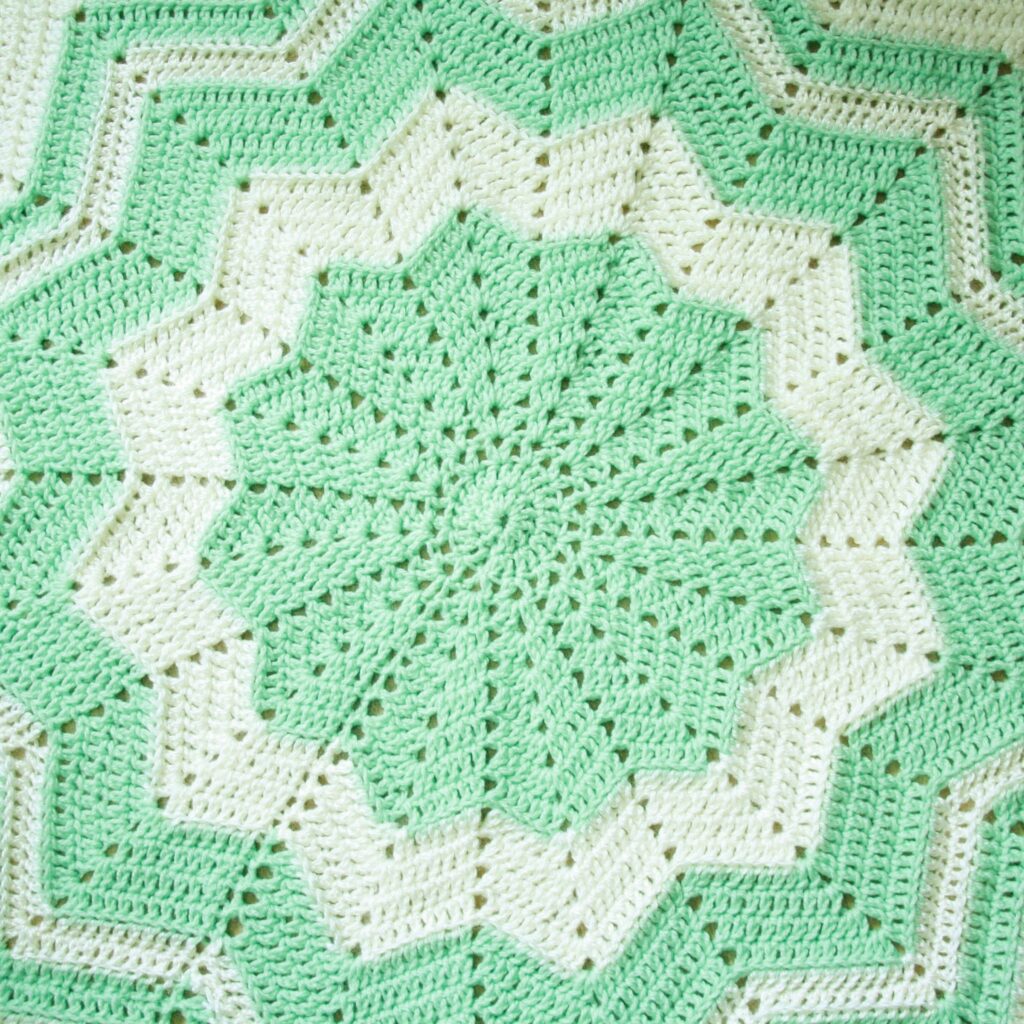 crochet sunburst blanket green