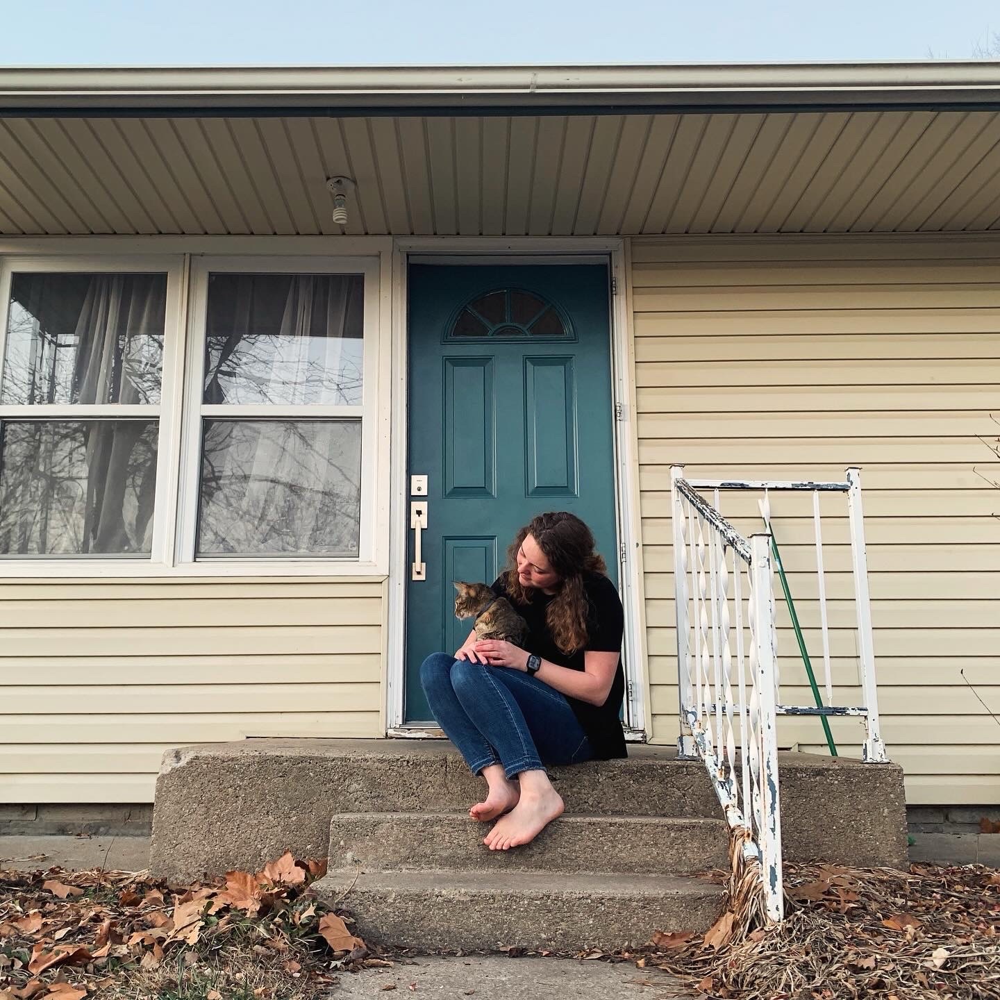 picture of Cora in front of her House in Kansas